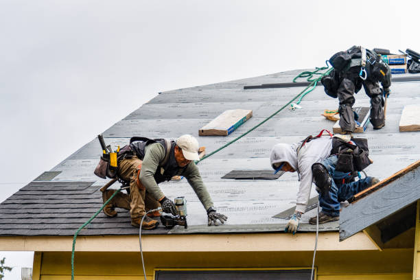 Professional Roofing technician working in Melrose, MA
